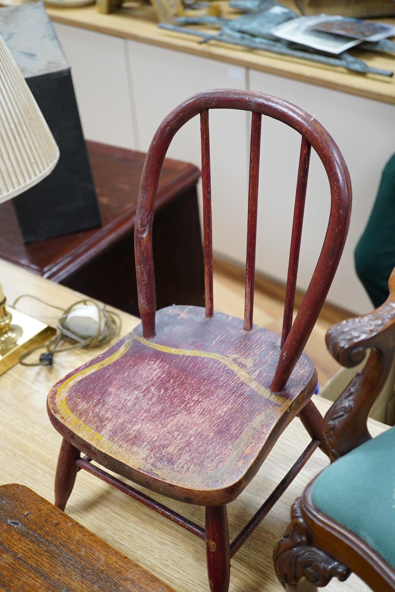 Two antique wooden stools and two children's chairs, one with arms and an upholstered seat x 51cm high